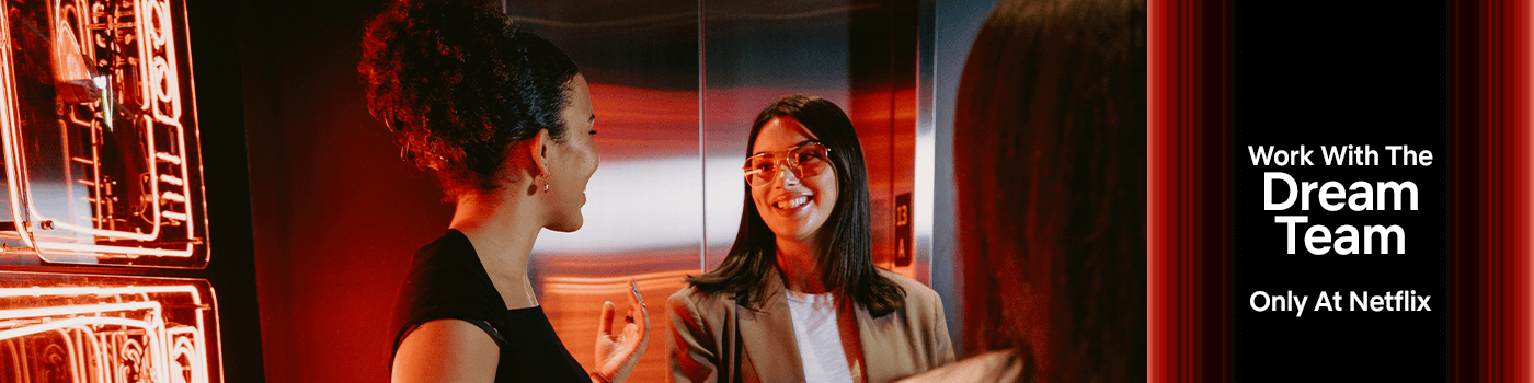 Three people engaged in conversation